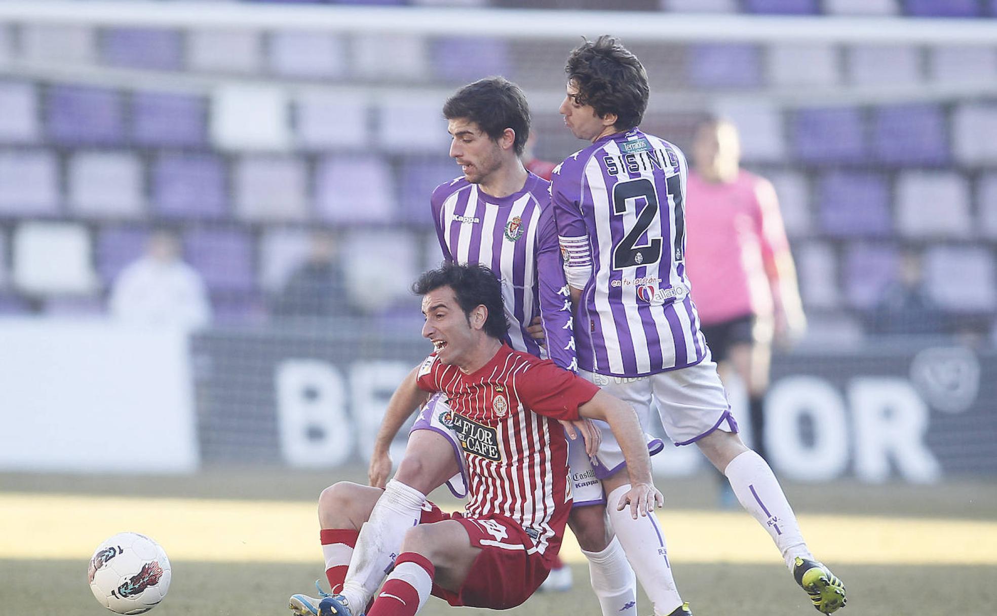 Víctor Pérez y Sisi en el partido frente al Girona de 2012