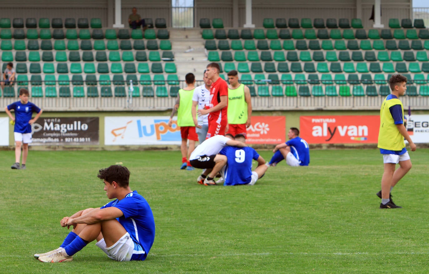 Los jugadores del Unami, desilusionados tras no poder lograr la victoria.