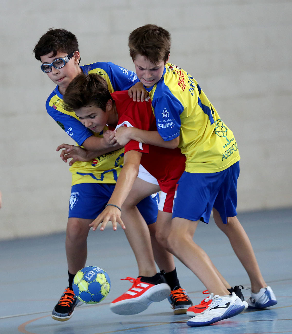 Fotos: Octava jornada de la competición de balonmano de Juegos Escolares