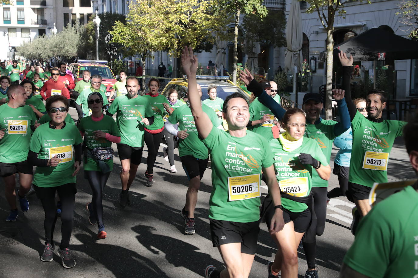 Fotos: La marcha contra el cáncer llena Valladolid de verde