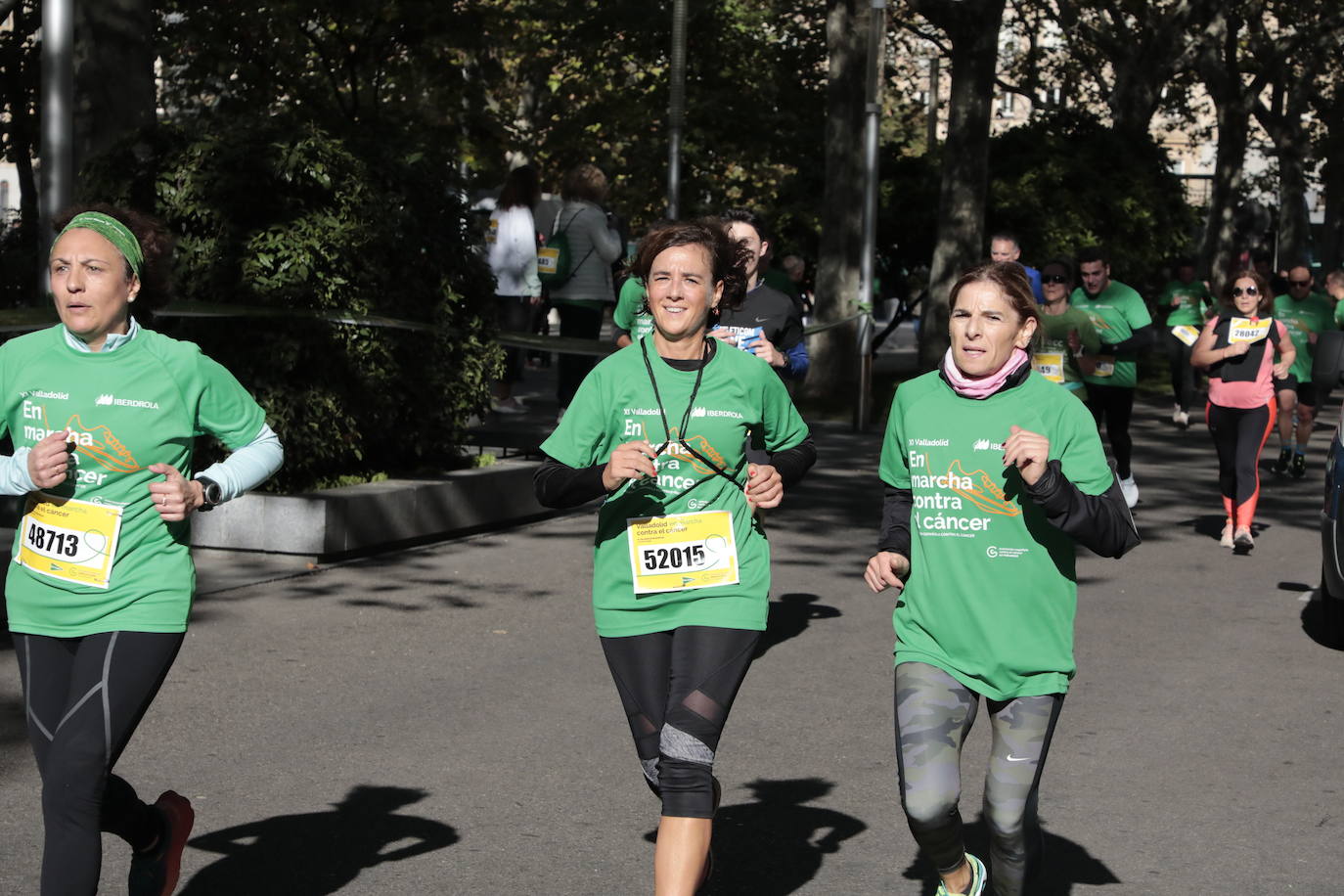 Fotos: La marcha contra el cáncer llena Valladolid de verde