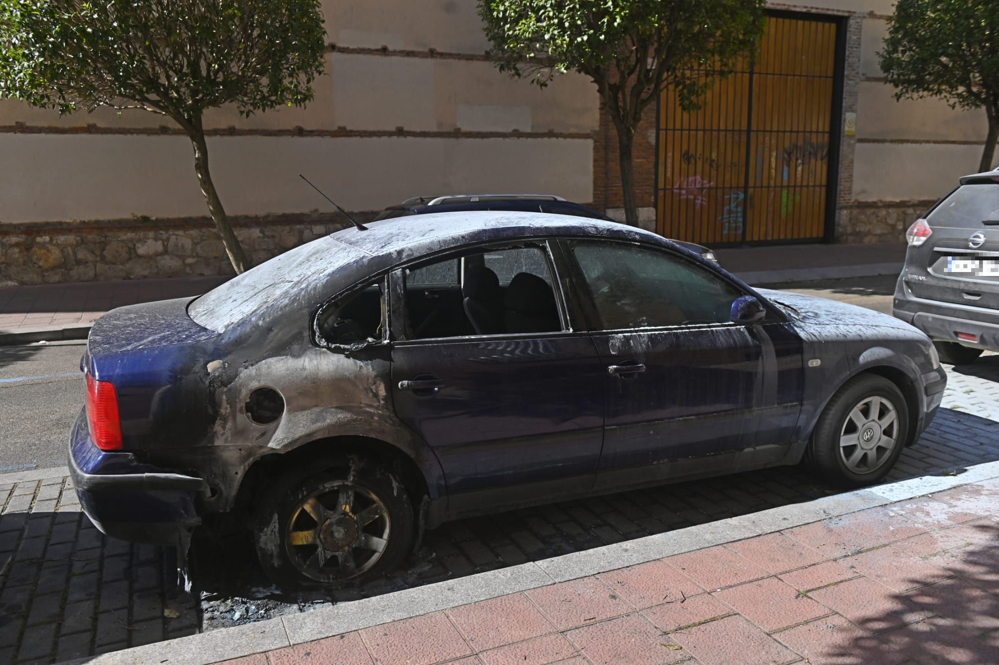 Queman dos coches, dos contenedores y un parquímetro en el centro de Valladolid