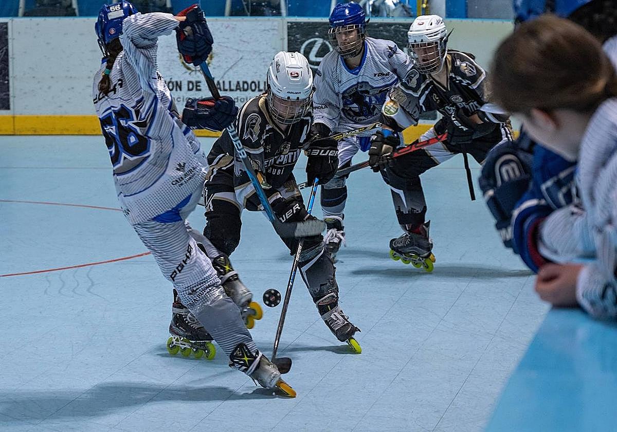 Una acción del partido entre el Munia y el Rubi.