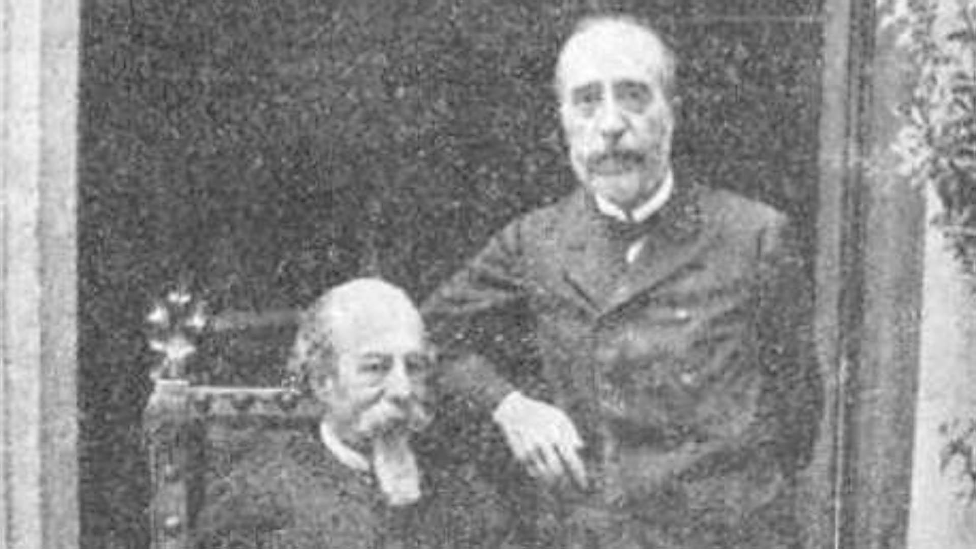 Miguel de los Santos Álvarez, de pie, junto al poeta José Zorrilla.