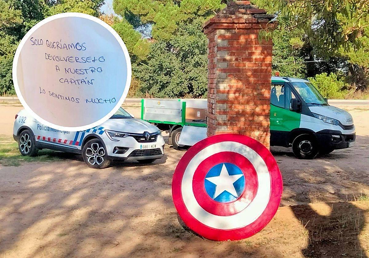 El escudo que había sido robado, este martes en la Cañada Real. En el círculo, nota que dejaron los vándalos.