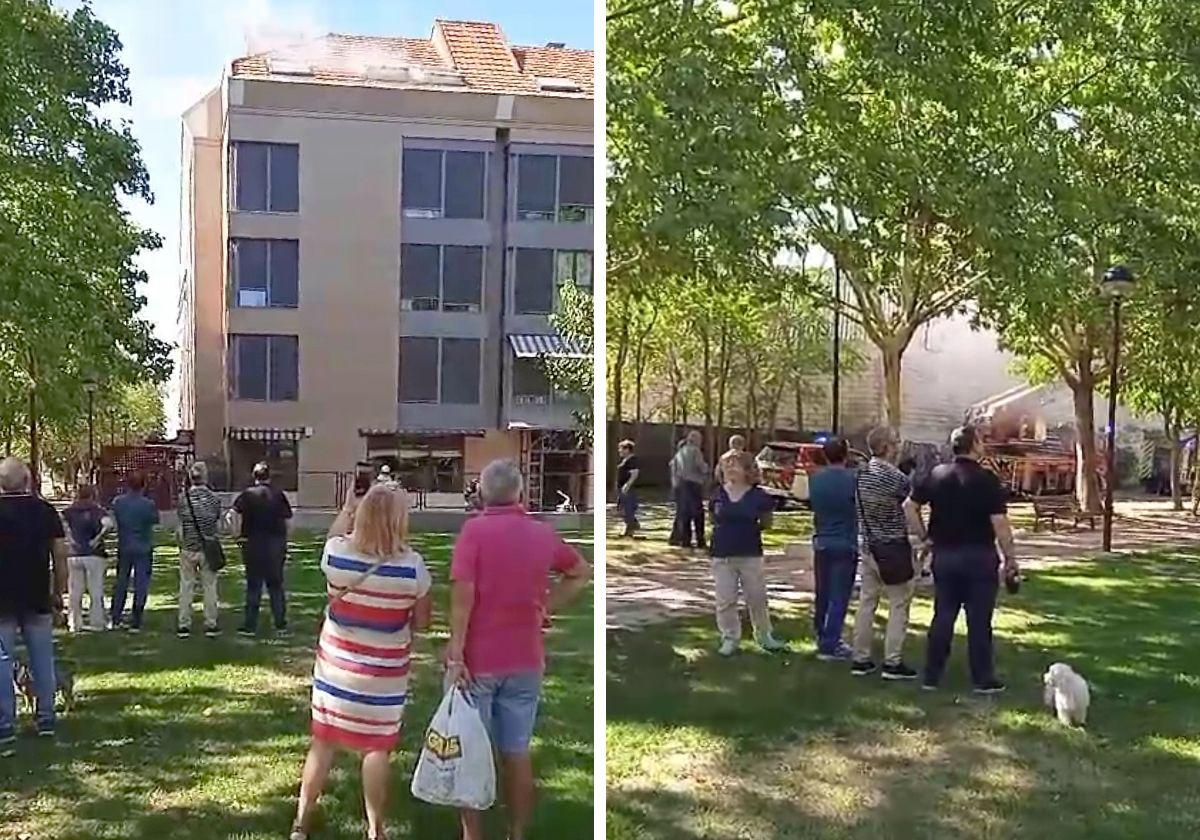 Labores de extinción y vecinos del bloque afectado por el incendio en el Callejón de la Alcoholera.