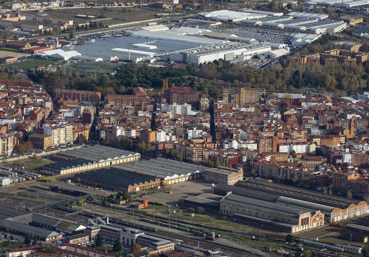 Vista aérea de los talleres de Renfe en Farnesio, en la parte interior de la imagen. Al fondo, planta de Iveco (año 2020).