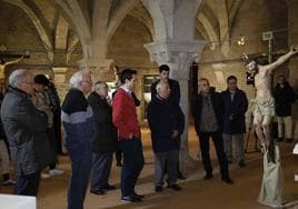 Asistentes al acto de entrega de las tallas restauradas en los talleres de la sede de Las Edades del Hombre, en el Monasterio de Santa María de Valbuena, San Bernardo.