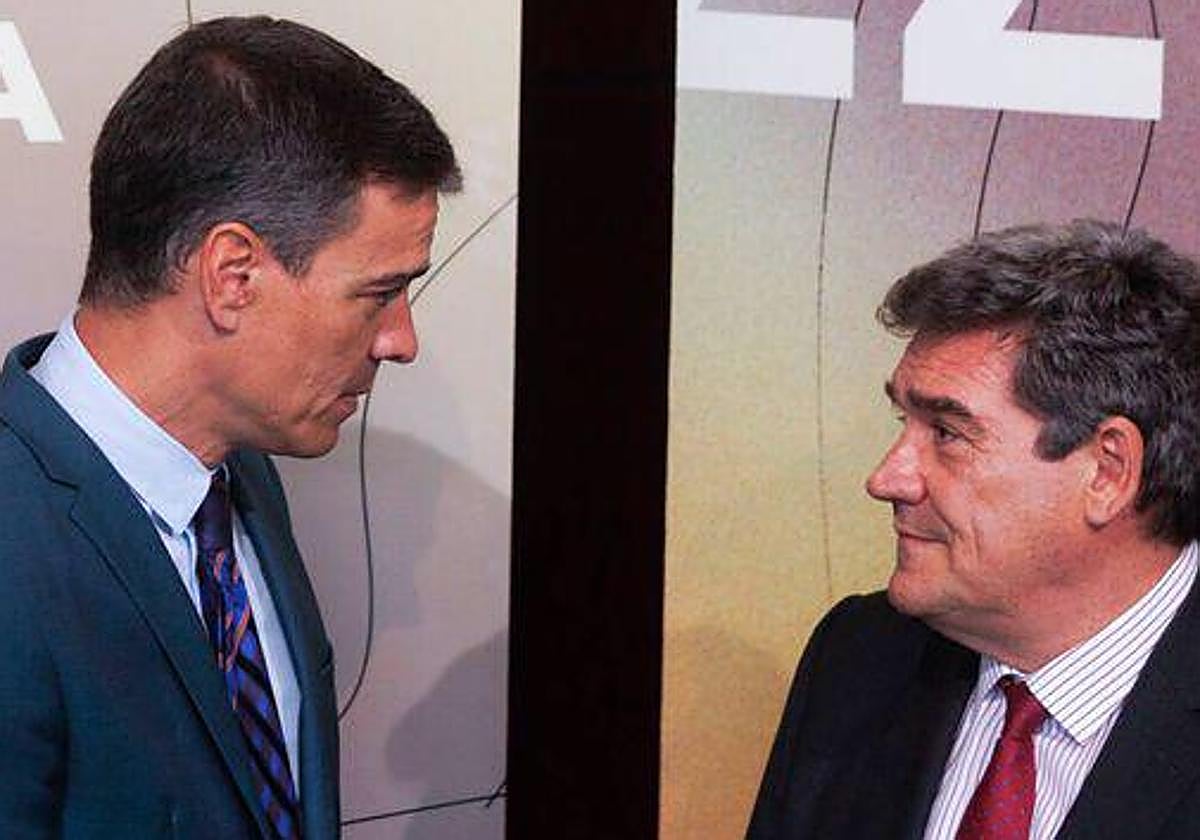 Pedro Sánchez y José Luis Escrivá.