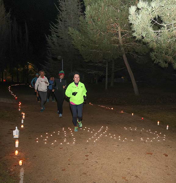 Correr entre velas en Palencia, un entrenamiento simpático
