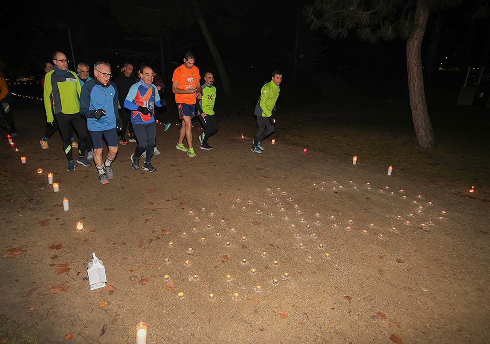 Correr entre velas en Palencia, un entrenamiento simpático