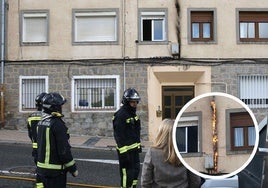Bomberos y técnicos del Ayuntamiento de Segovia, en el incendio declarado en San José este lunes. En el círculo, las llamas consumen el cableado.