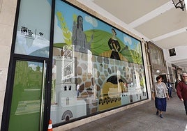 Vinilo instalado por el Ayuntamiento en Villandrando que quiere servir de ejemplo de mejora de escaparate.