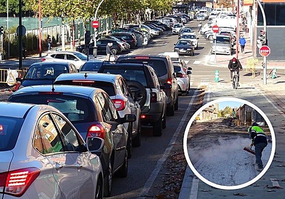 Retenciones en la bajada del Páramo de San Isidro hacia Juan Carlos I, a la altura del tramo cortado entre Tórtola, Villabáñez y Puente La Reina. En detalle, labores de asfaltado en el cruce del paseo con Juan Carlos I.