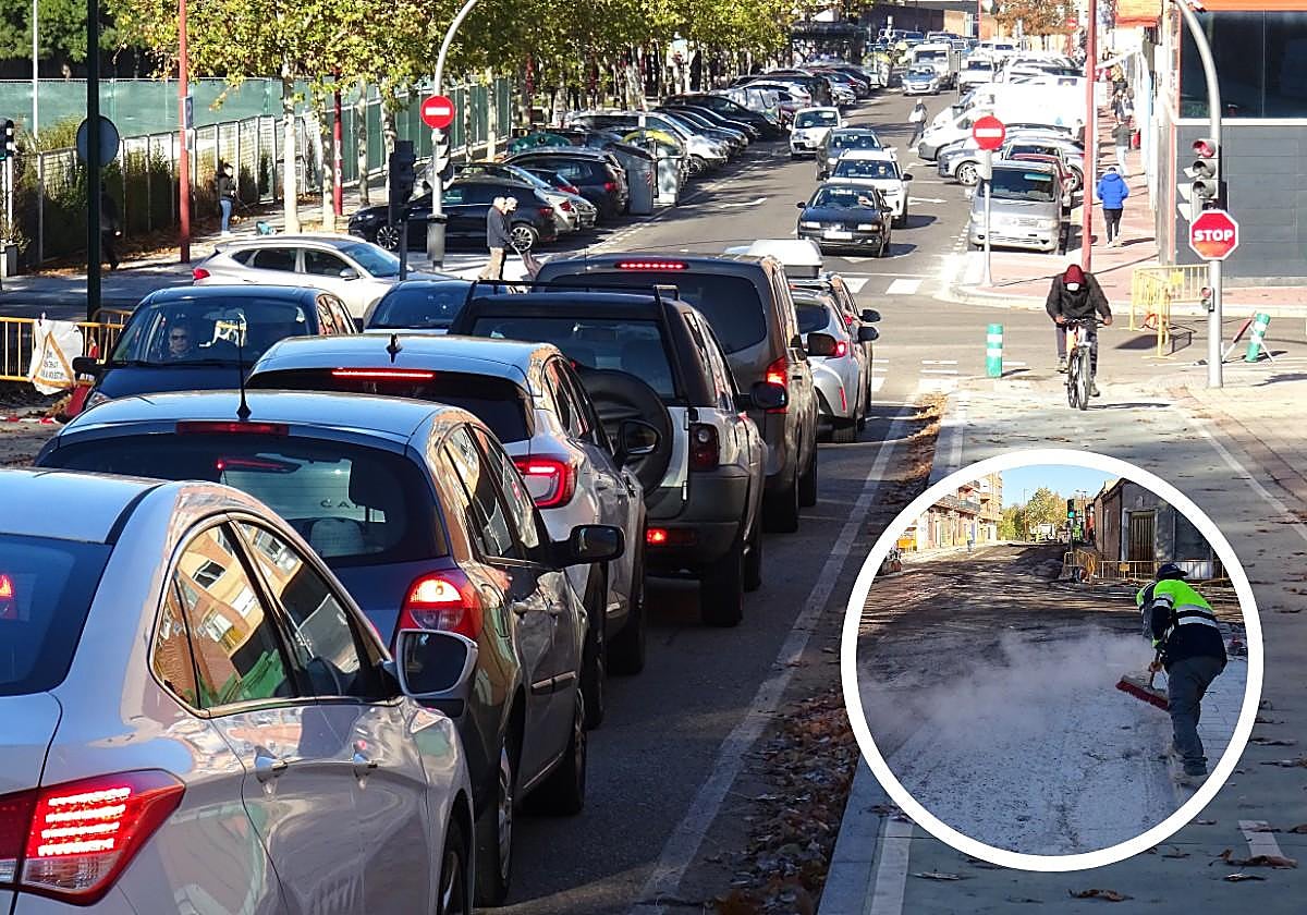 Retenciones en la bajada del Páramo de San Isidro hacia Juan Carlos I, a la altura del tramo cortado entre Tórtola, Villabáñez y Puente La Reina. En detalle, labores de asfaltado en el cruce del paseo con Juan Carlos I.