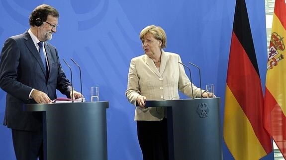Mariano Rajoy y Angela Merkel. 