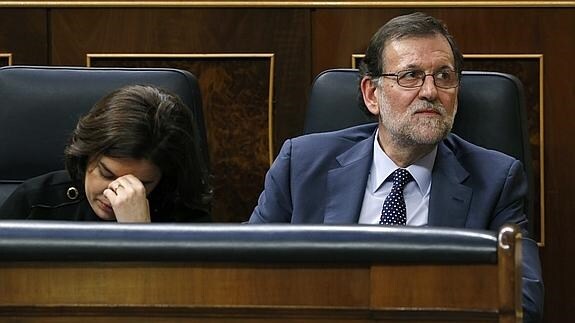 Soraya Sáenz de Santamaría y Mariano Rajoy. 