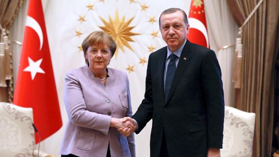 Merkel y Erdogan.