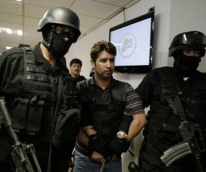 La Policía escolta a García Montoya 'El Compayito'. ::
STRINGER/REUTERS