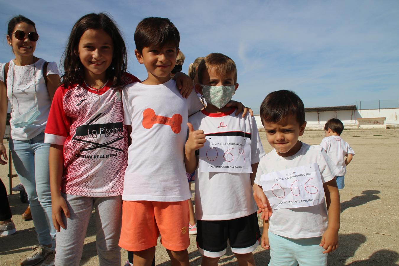 Participantes en la carrera solidaria por los afectados por el volcán canario. 