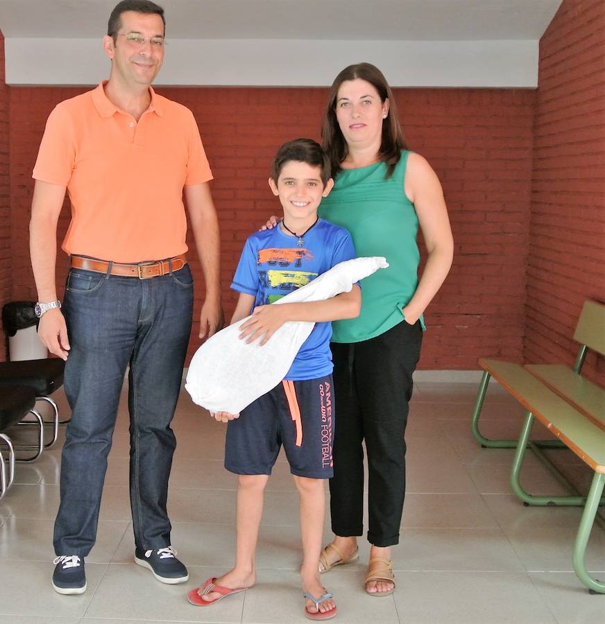 Dolores Carrasco gana el jamón de la Escuela de Música
