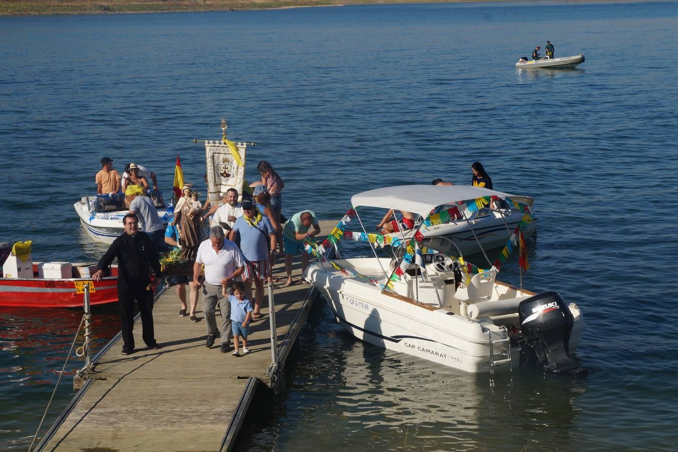 Llegada de la Virgen del Carmen al embarcadero de Peloche. María José Marchena