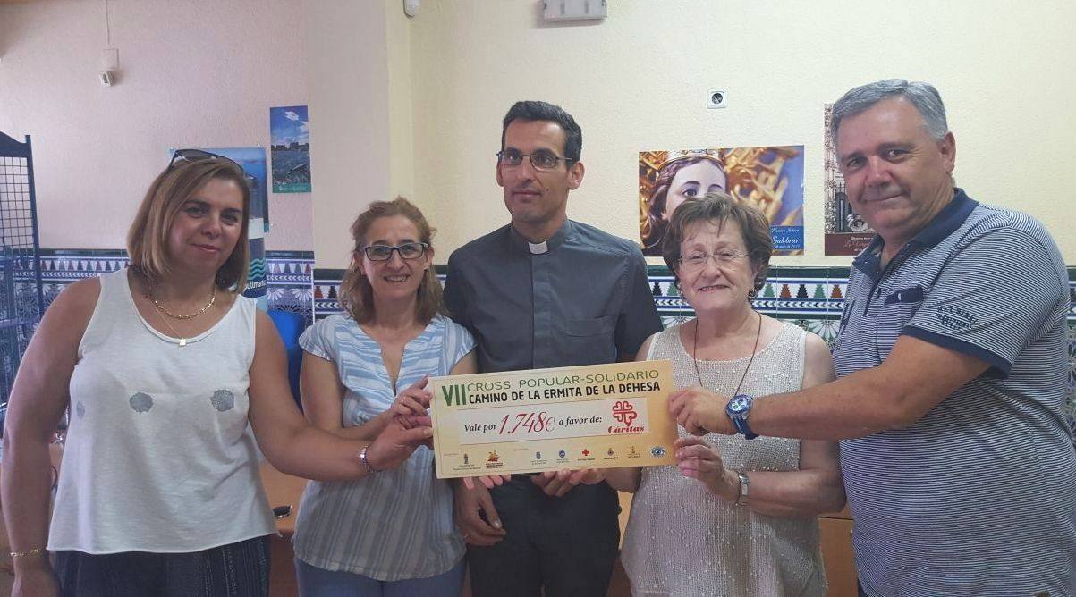 Acto de la entrega de la recaudación.