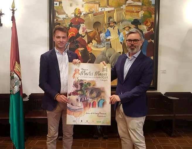 Los alcaldes de Jaraíz y Plasencia presentando el cartel del  Martes Mayor.