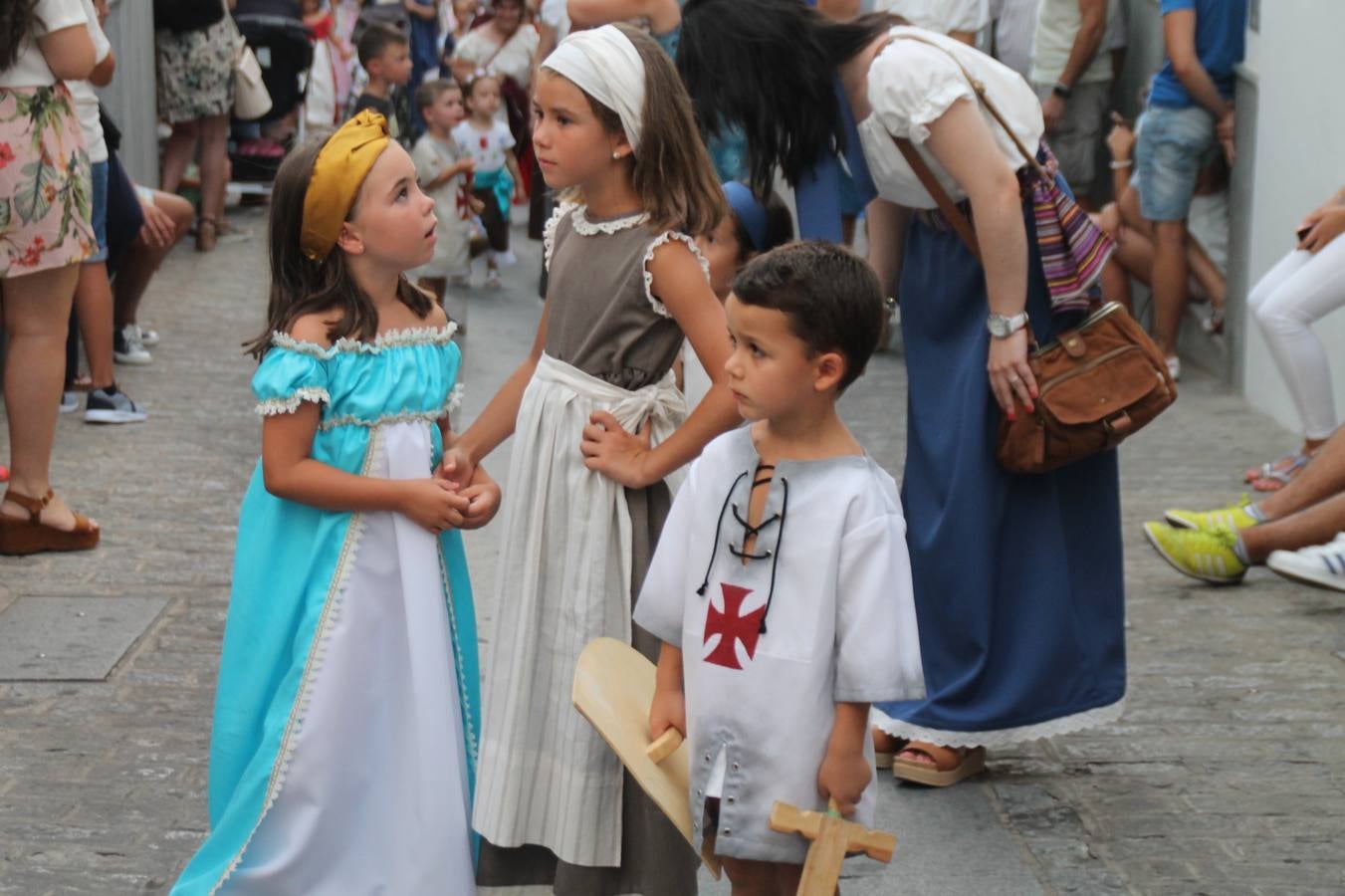 Escena de animación de calle en la fortaleza templaria.