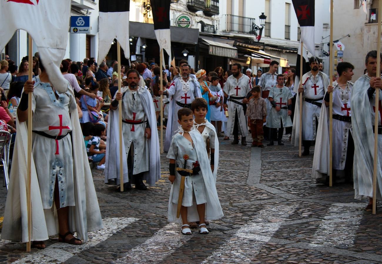 Escena de animación de calle en la fortaleza templaria.