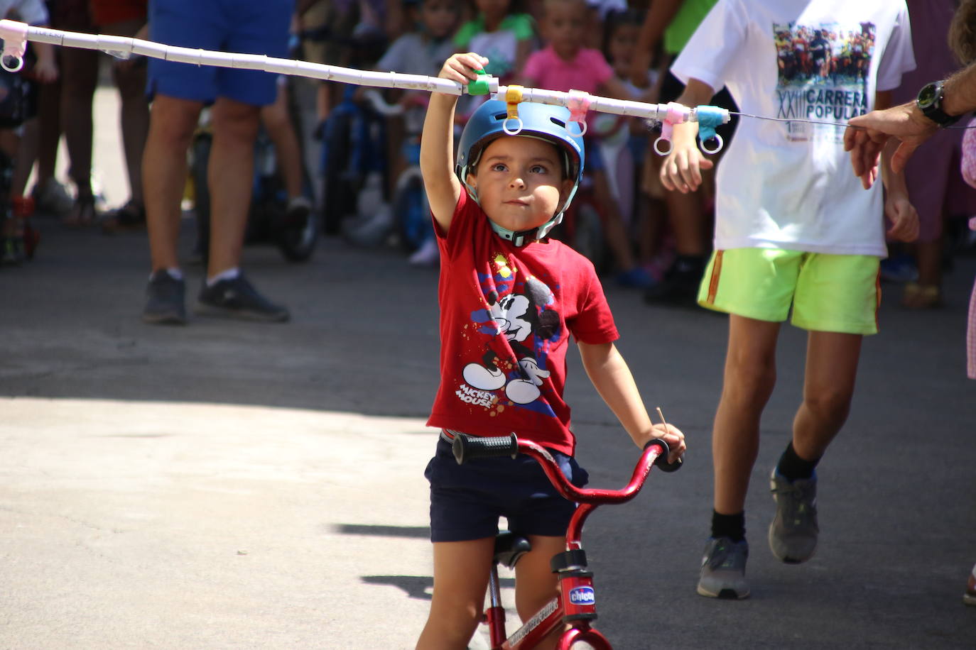 Fotos: Los más pequeños disfrutan con los juegos tradicionales en la «velá» del barrio de los Santos Mártires