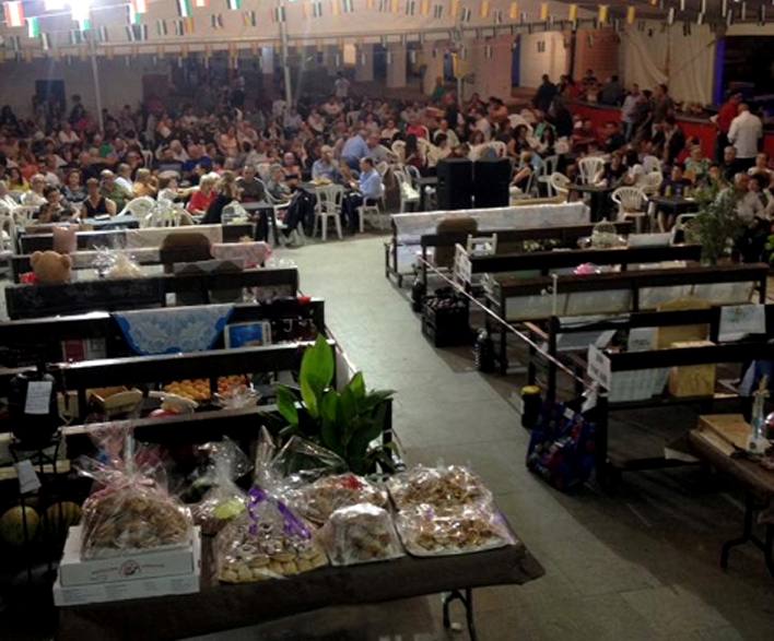 La tradicional subasta echa el cierre a la Feria