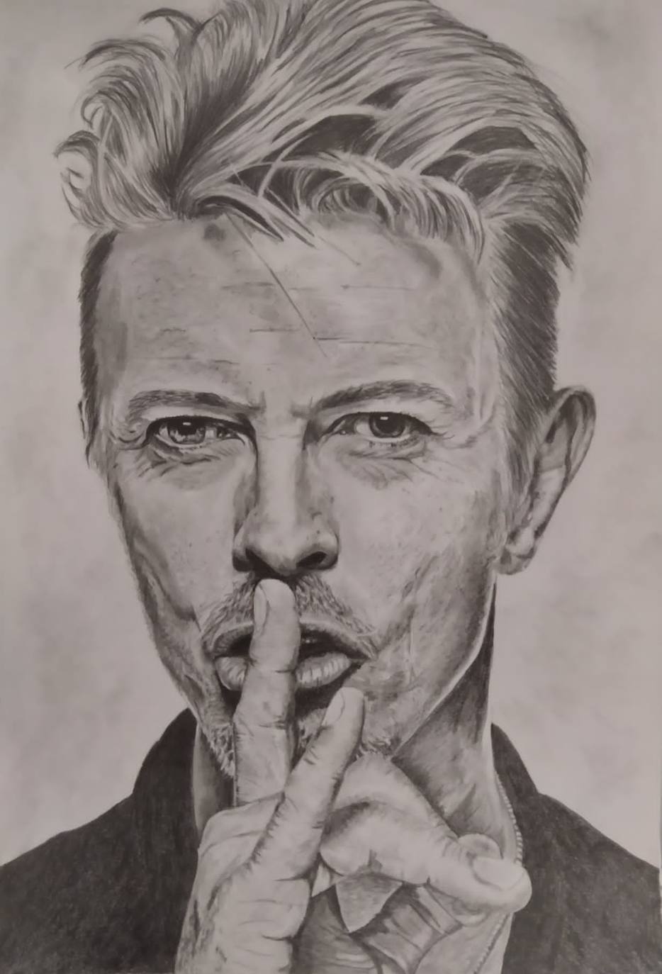 Uno de sus retratos a lápiz 