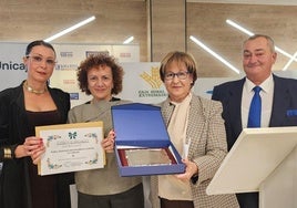 Recogida del cheque y la placa.