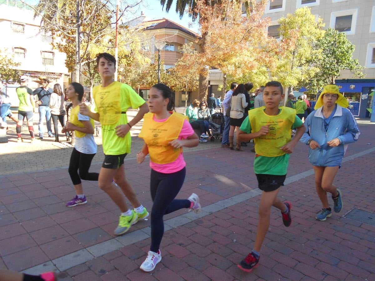 Carrera infantil por el centro de la población 