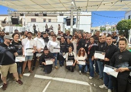 Participantes en la demostración de corte de jamón