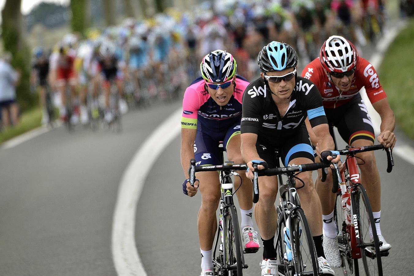 (De I a D) Davide Cimolai, Vasil Kiryienka y Adam Hansen.