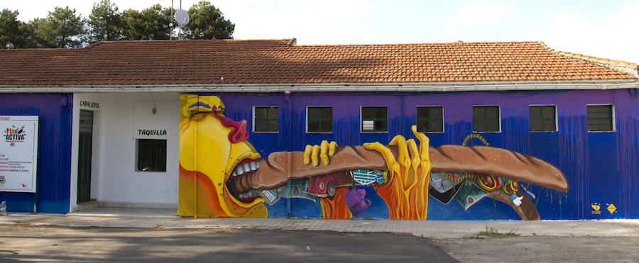 Mural sobre consumismo en Talayuela.