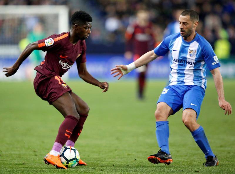 Dembelé, durante el partido contra el Málaga en La Rosaleda