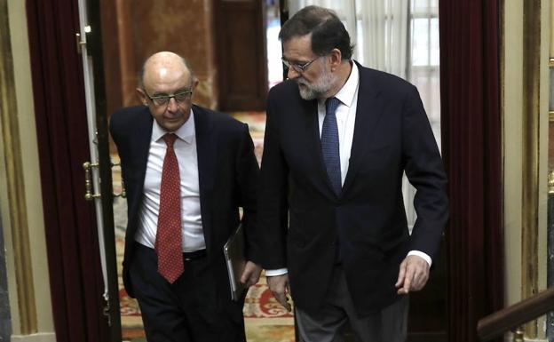 Montoro y Rajoy.