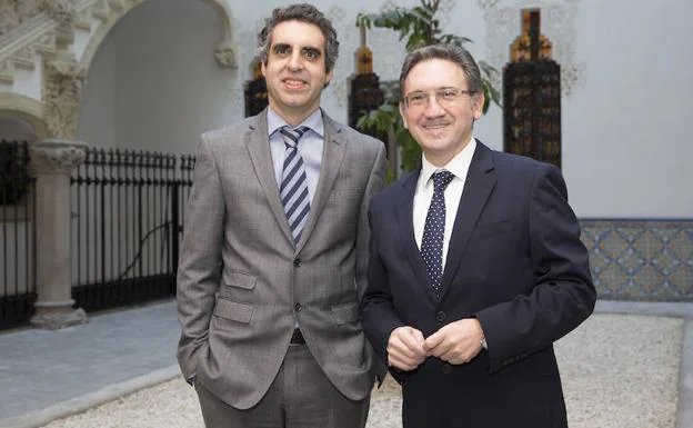 El doctor Manel Esteller y Jaume Giró, director general Fundación Bancaria la Caixa. 