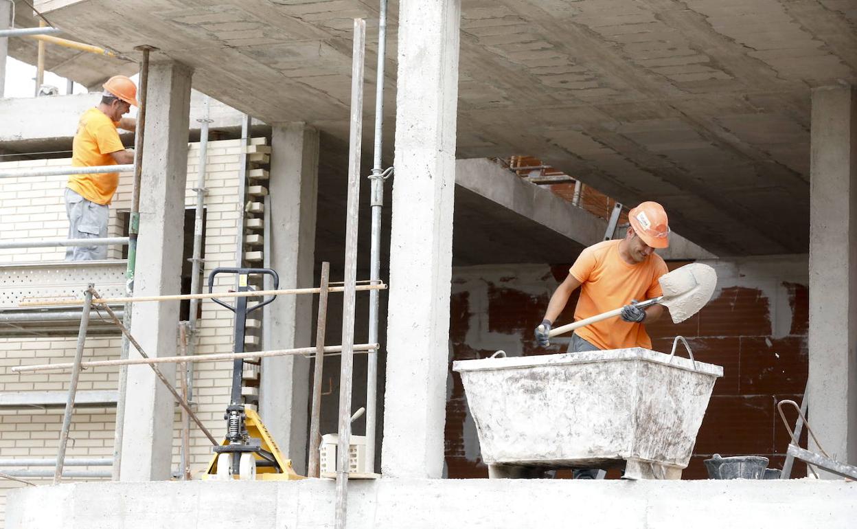 Trabajadores de la construcción.: 