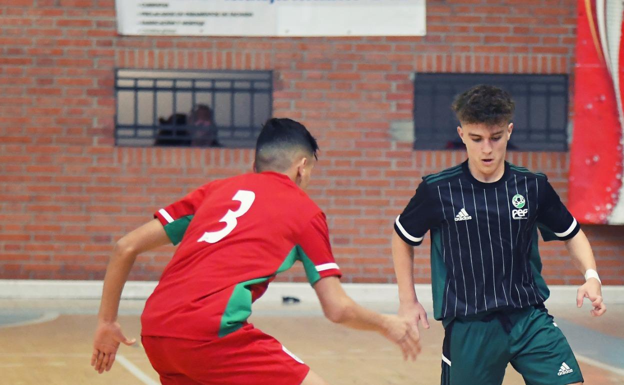 Víctor Requero durante un partido con la selección extremeña de fútbol sala. 