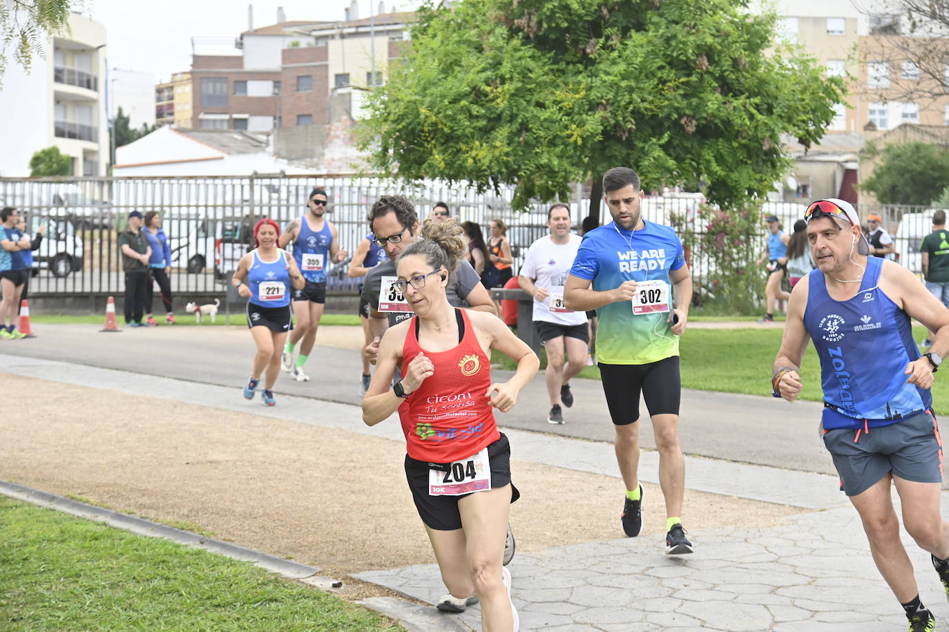 Fotos: FIesta en la VI Carrera por la Diversidad &#039;Los Palomos-Aqualia&#039; de Badajoz