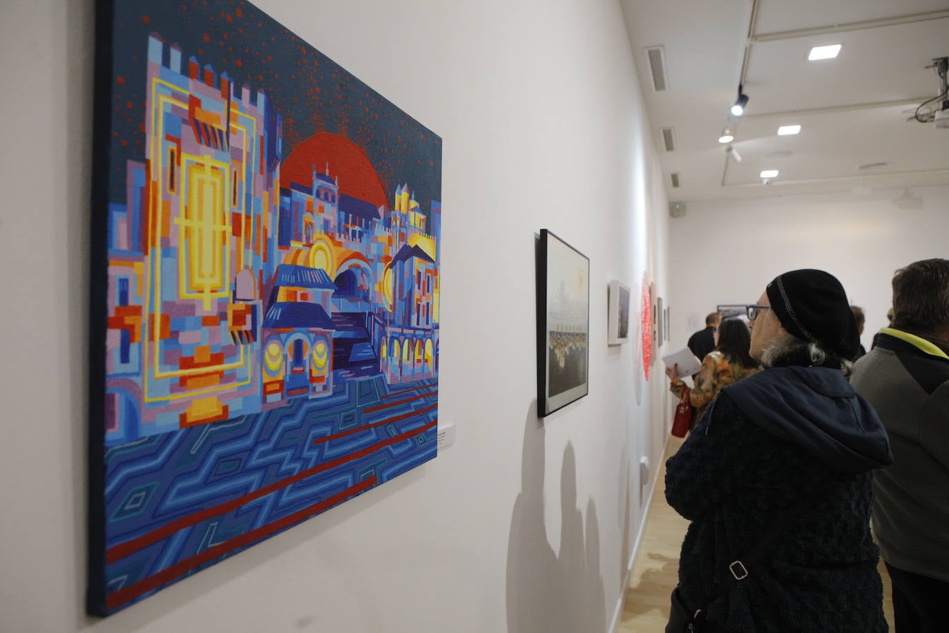 Exposición 'La Plaza de nuestra vida' a beneficio del Banco de Alimentos de Cáceres