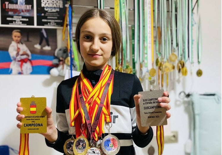 Candela, con sus medallas.