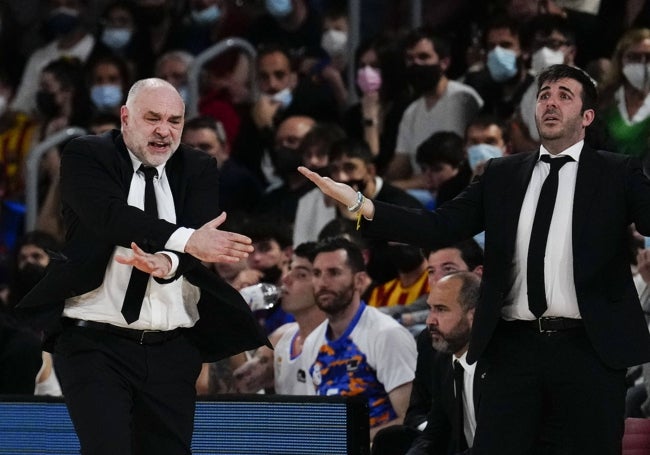 Con Laso cuando era el entrenador del Real Madrid y junto a Chus Mateo.