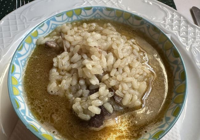 Arroz caldoso con carrilleras.