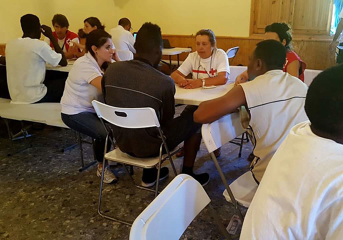 Voluntarios y migrantes en el centro de Mérida en una imagen de archivo.