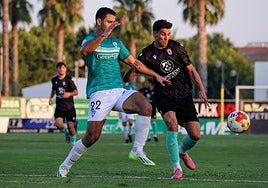 Sebas (izquierda) y David Grande (derecha) durante un partido de pretemporada.